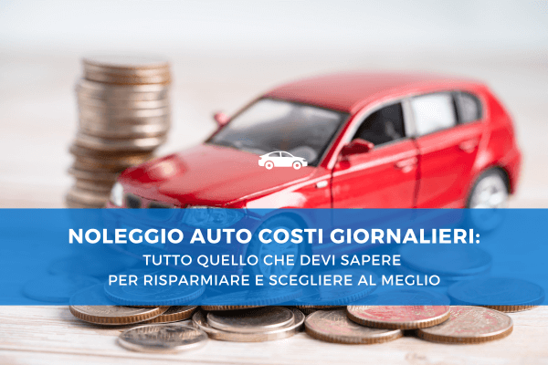 Modellino di auto rossa posizionato su un tavolo accanto a pile di monete, simbolo dei costi e del risparmio legati al noleggio auto giornaliero.